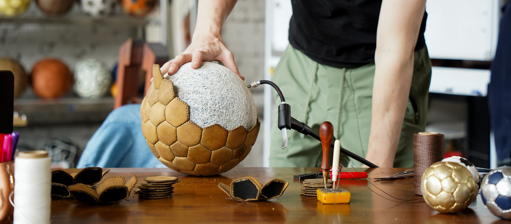 Jon-Paul, working on making a 92 panel ball.